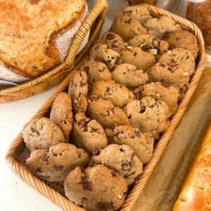 Spiced pecan sourdough cookies displayed in a rattan basket.