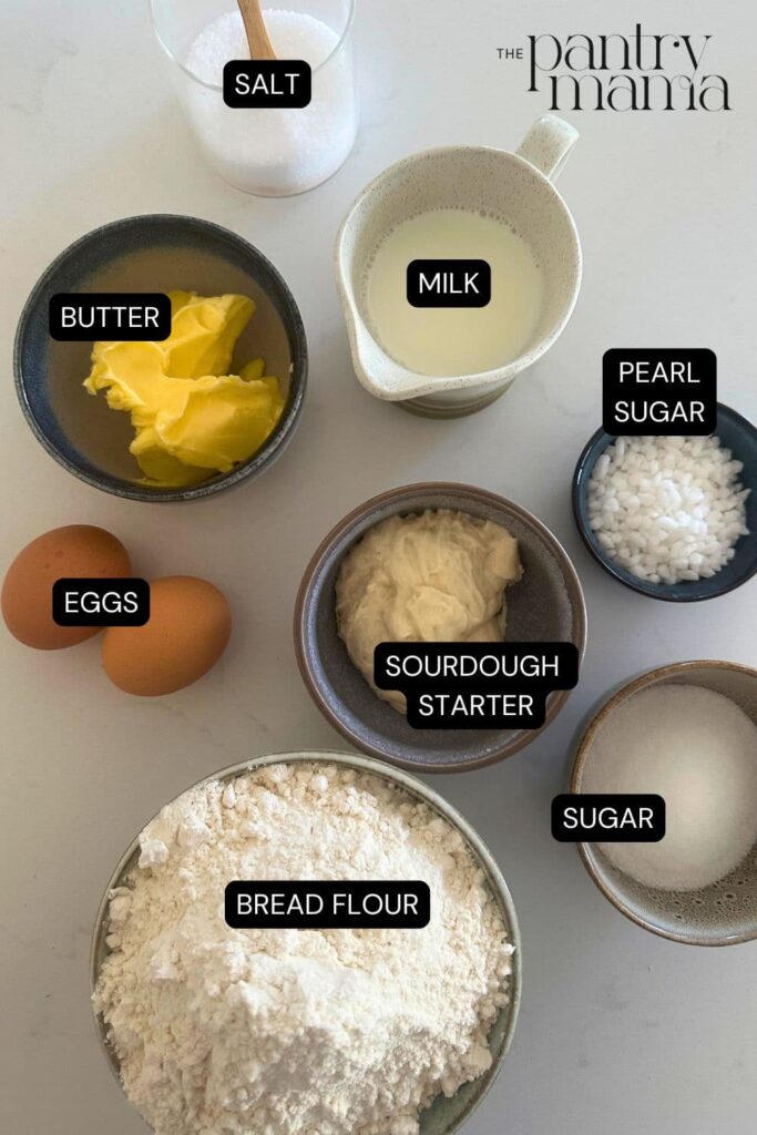 Flay lay of ingredients necessary to make a sweet braided sourdough loaf.