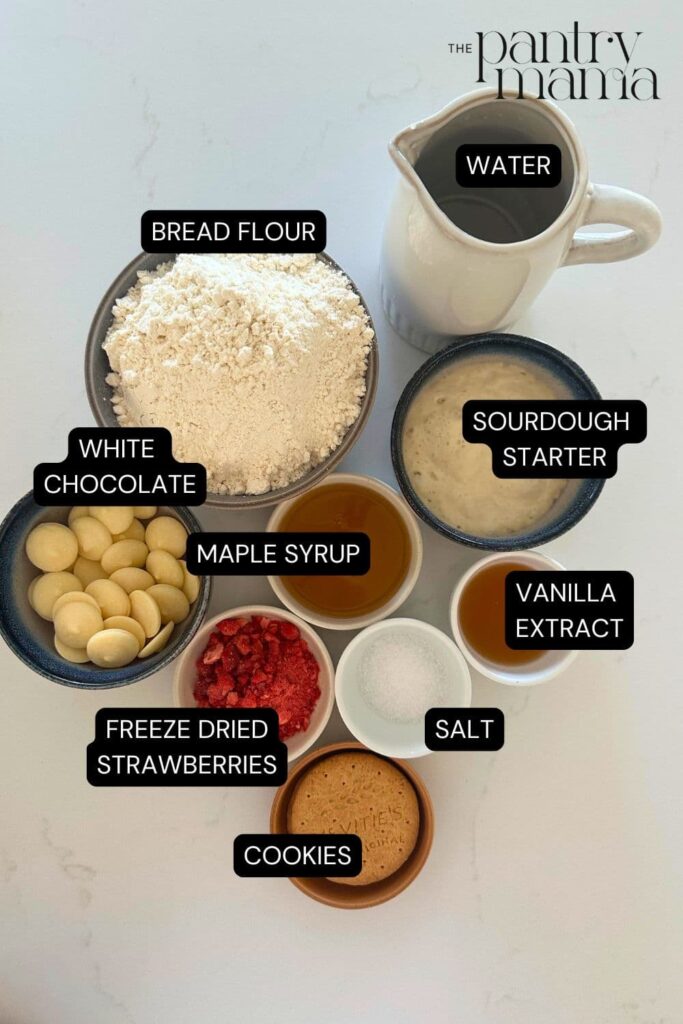 Flat lay of ingredients necessary to make sourdough strawberries and cream loaf.