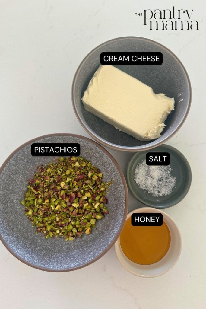 Honey pistachio cream cheese ingredients on counter.