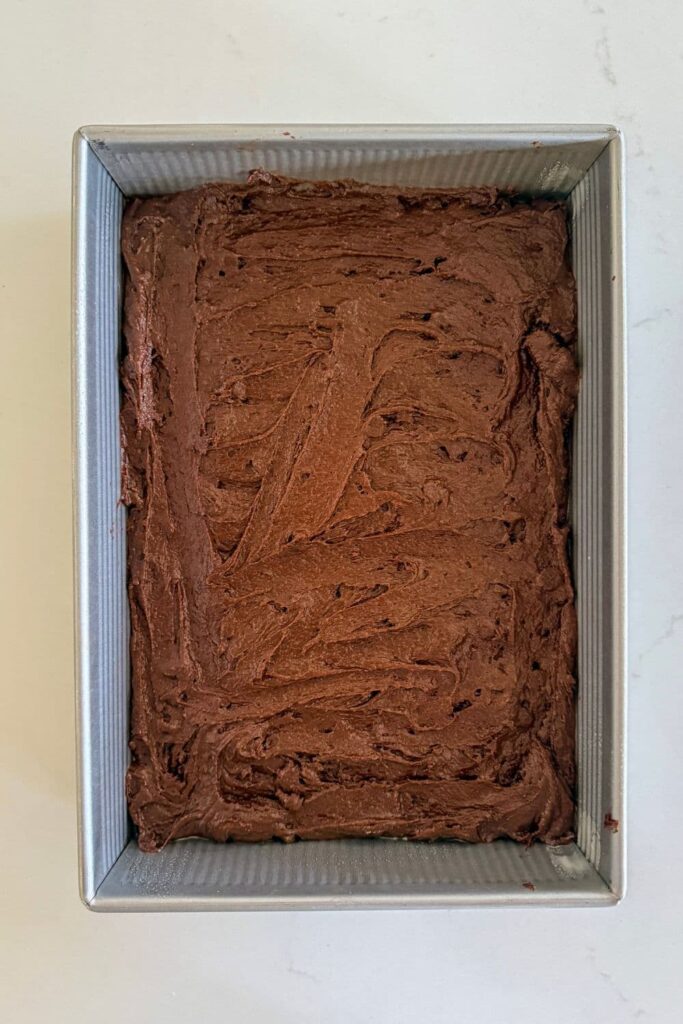 A 9" x 13" tray of sourdough brownie batter.