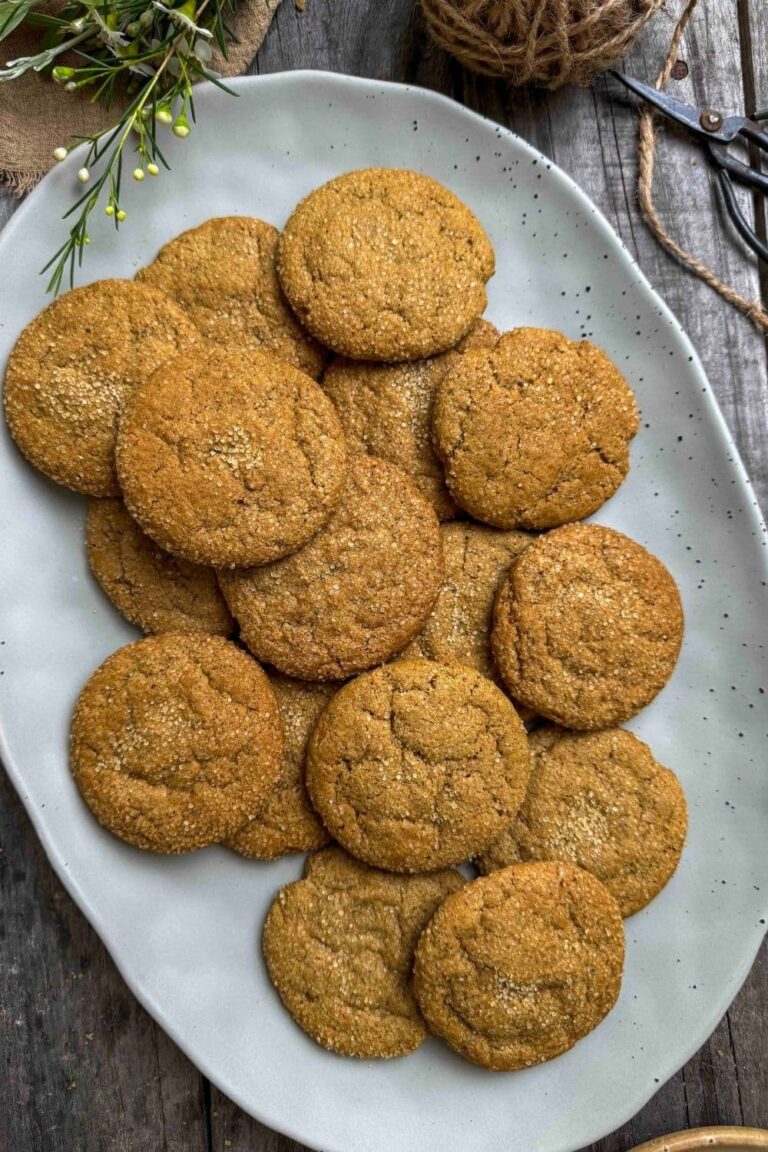 sourdough ginger molasses cookies on serving plate.