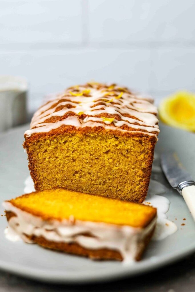 Sourdough Lemon loaf sliced on serving plate.
