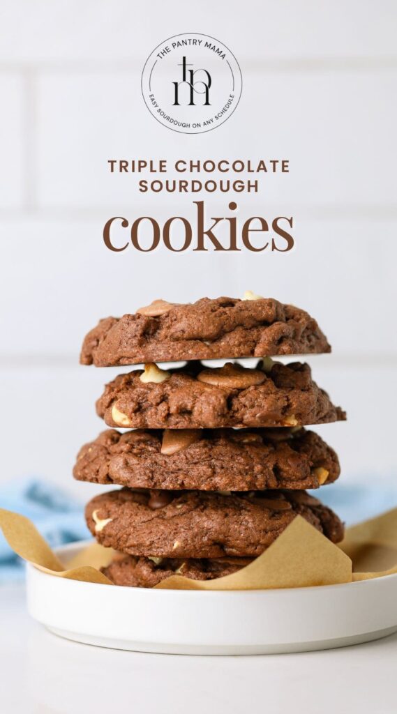 A stack of 5 rich sourdough triple chocolate cookies layered with 3 types of chocolate (semi sweet chocolate, milk chocolate and white chocolate).