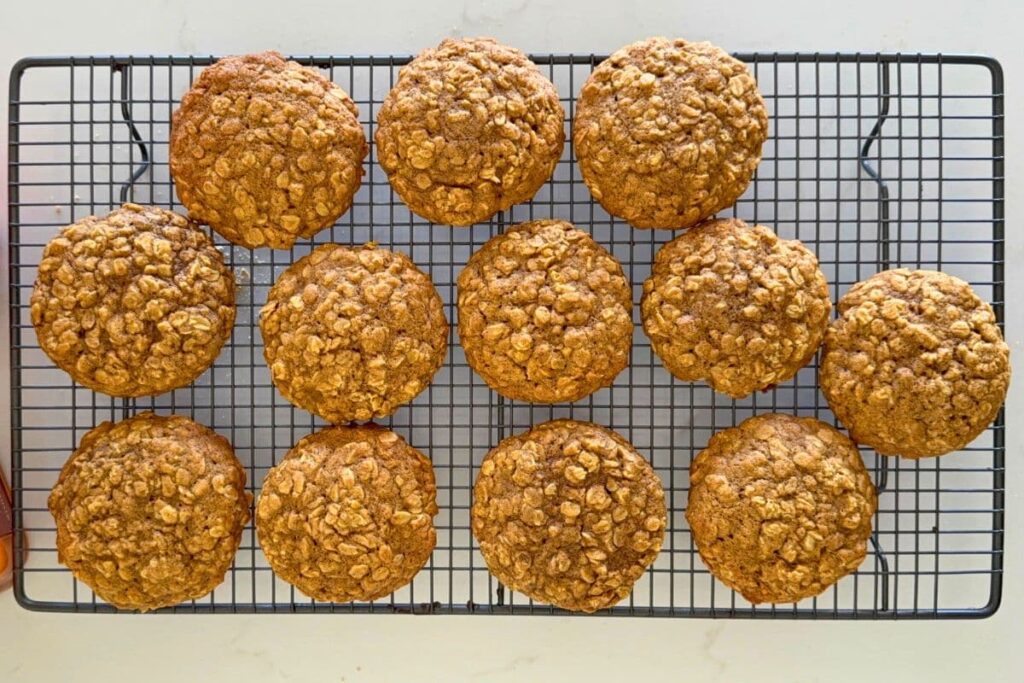 Fresh baked sourdough pumpkin oatmeal cookies cooling on a wire rack.