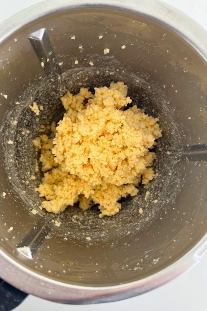 Cheese and garlic blitzed together in food processor for the filling for sourdough cheese and garlic rolls.