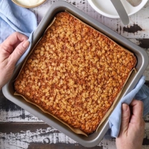 Close up of fresh baked sourdough baked oatmeal in a baking pan.